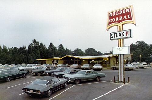 A parking lot of an old Golden Corral from the 1960s