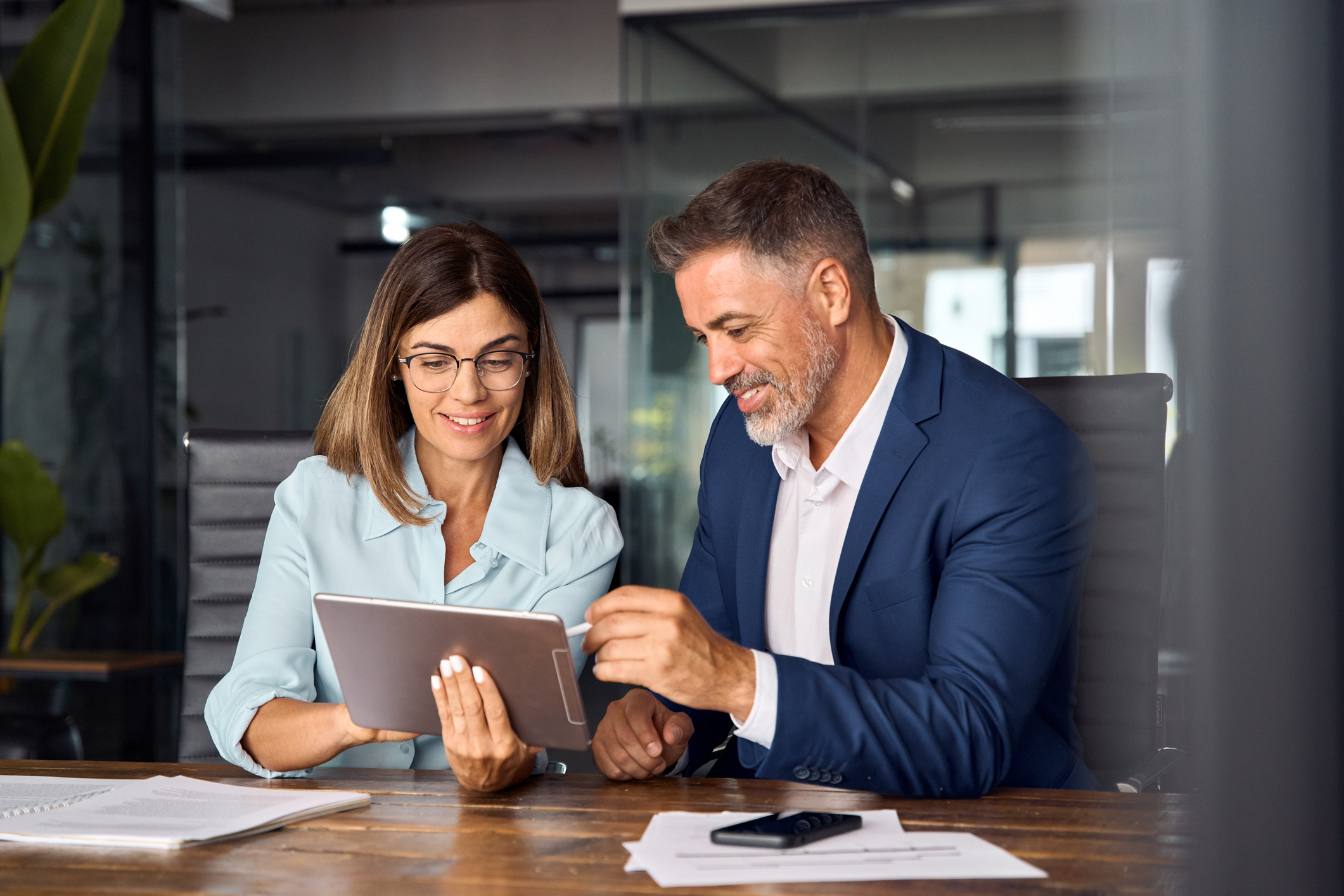 Two colleagues of professional business people working together. stock photo