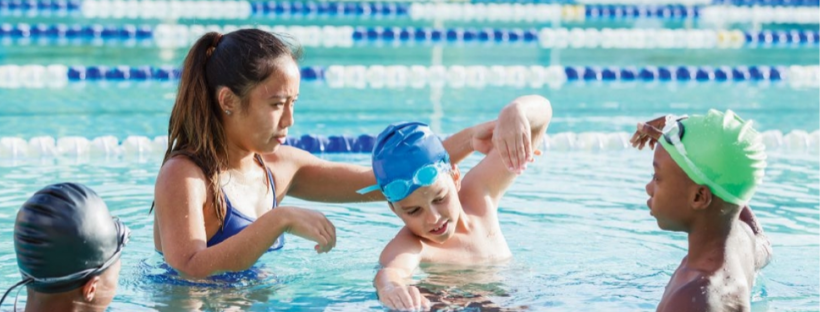 Swim instructor and kids