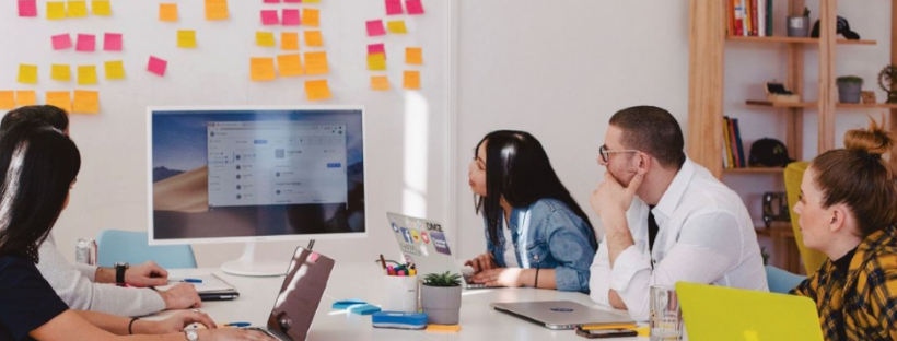 Workers studying consumer reviews